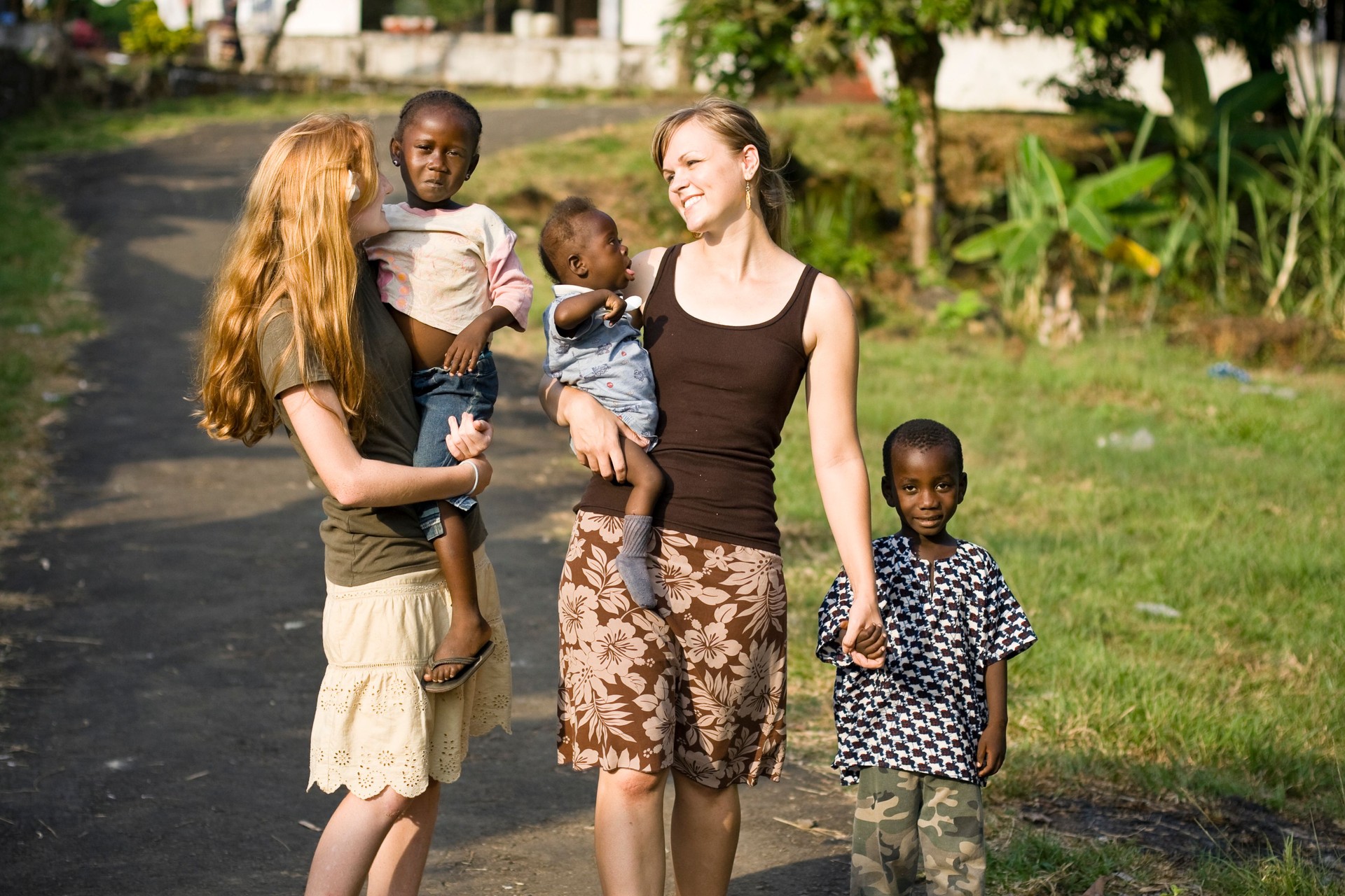 Young Women With African Children