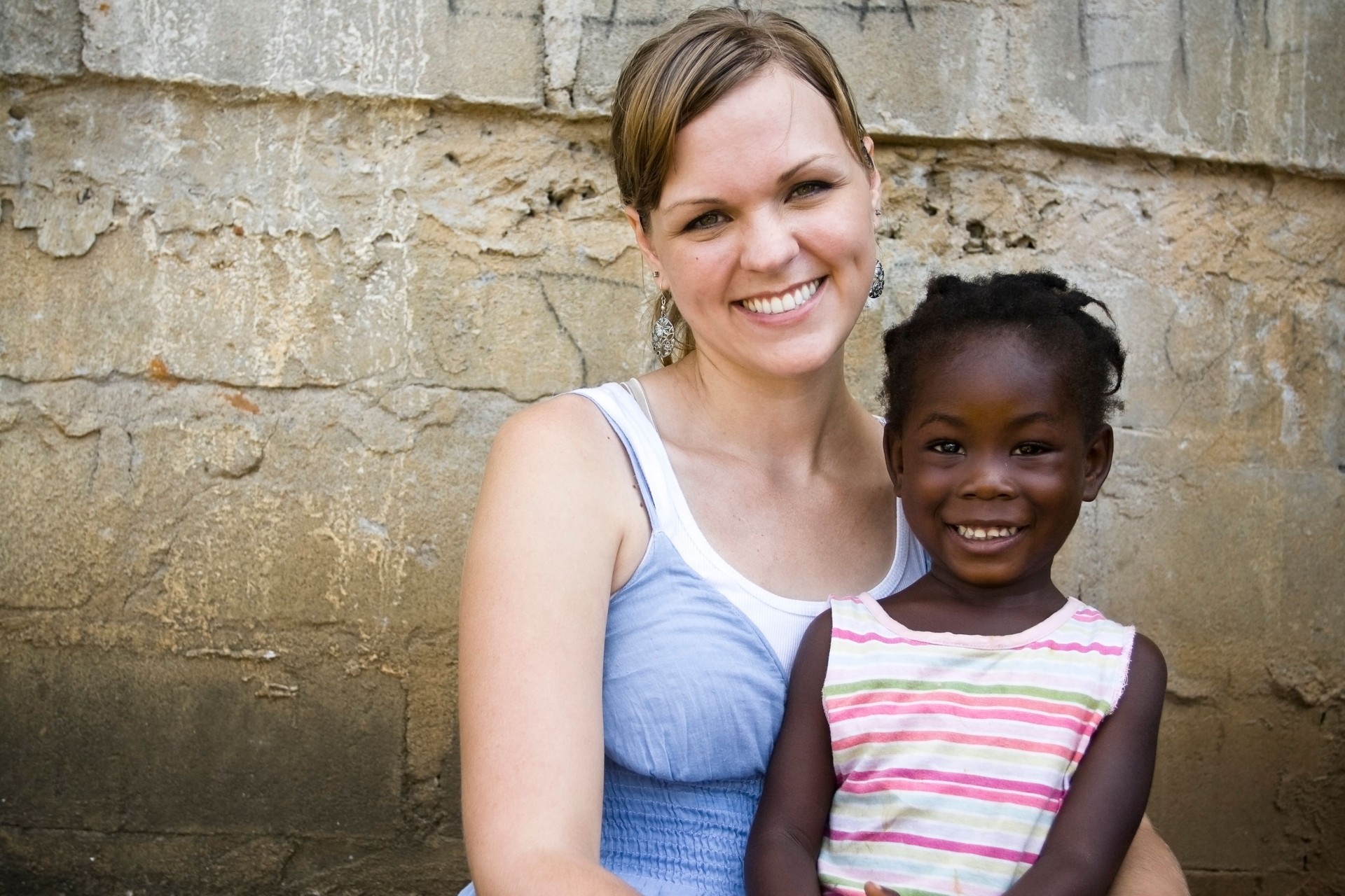 American Woman With African Child